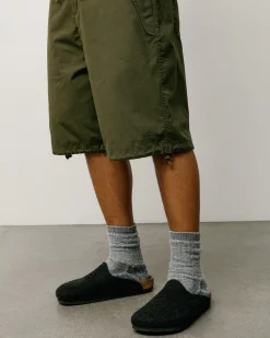 SURPLUS SHORT